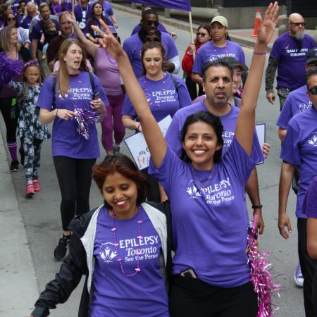 IMG_3140 Participants walking down the street in the Purple Walk