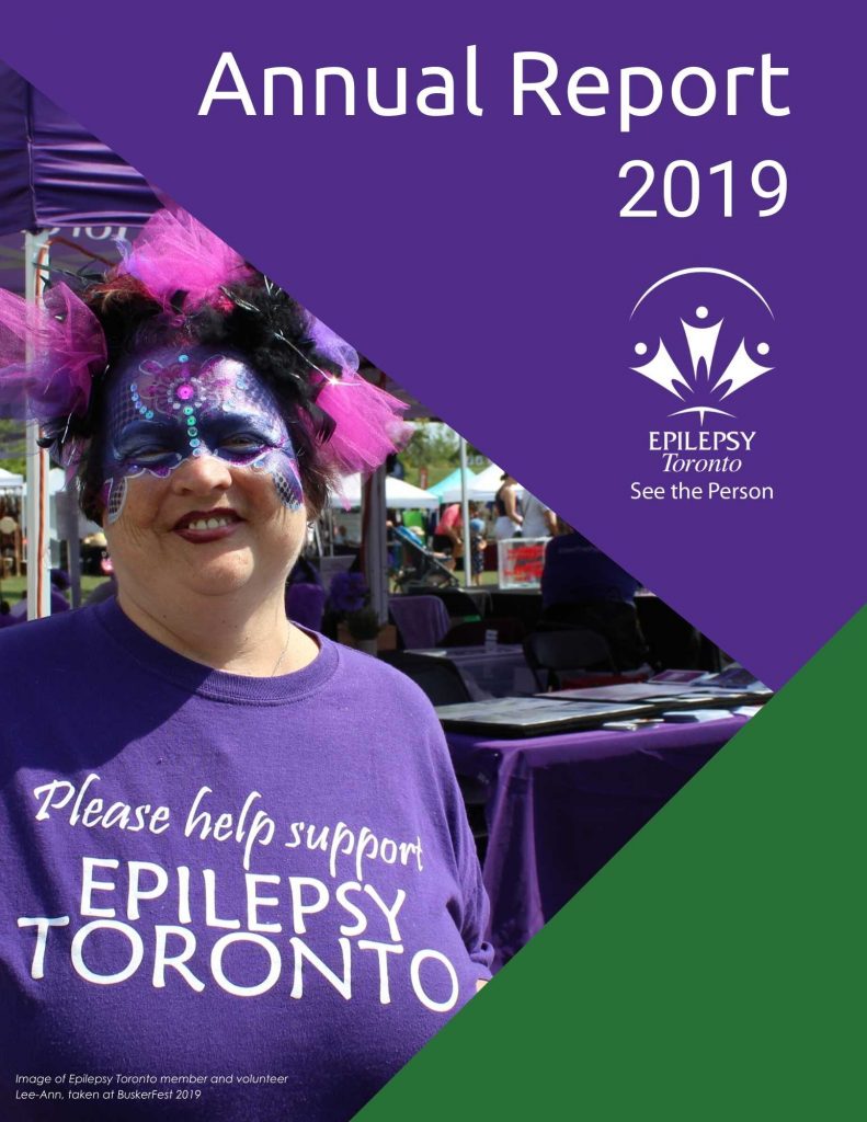 Woman with elaborate purple facepaint at BuskerFest