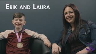 9 year old Erik, wearing a medal and his mom Laura, both smiling.