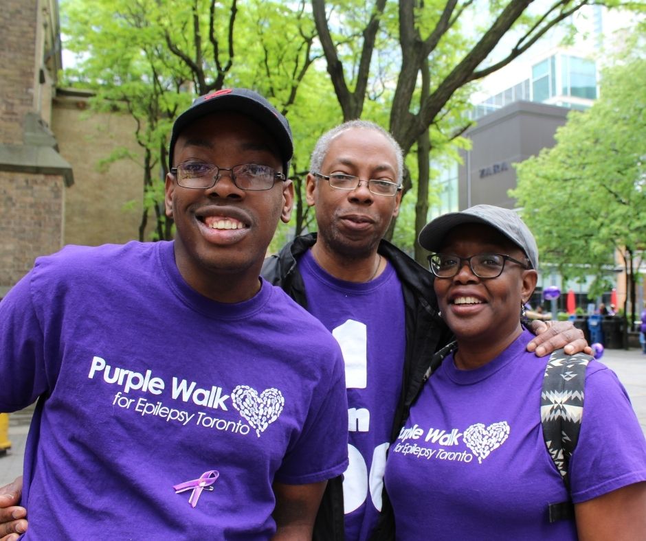 Adult Services Webpage Images (1) family posing at the Purple Walk